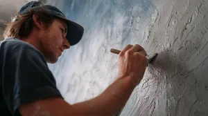 a-skilled-craftsman-applying-decorative-plaster-to - copy (1).png a-skilled-craftsman-applying-decorative-plaster-to - copy (1).png