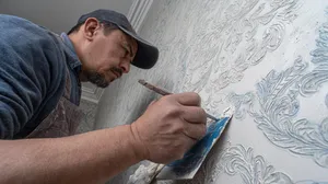 a-skilled-craftsman-applying-decorative-plaster-to - copy (2).png a-skilled-craftsman-applying-decorative-plaster-to - copy (2).png